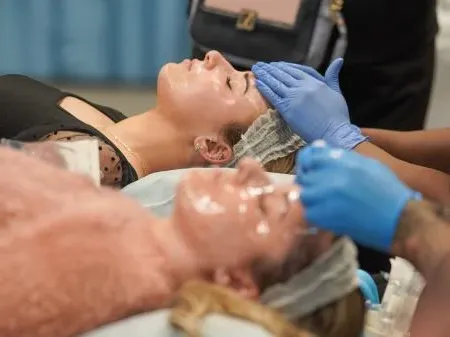 Image of people receiving cosmetic treatment